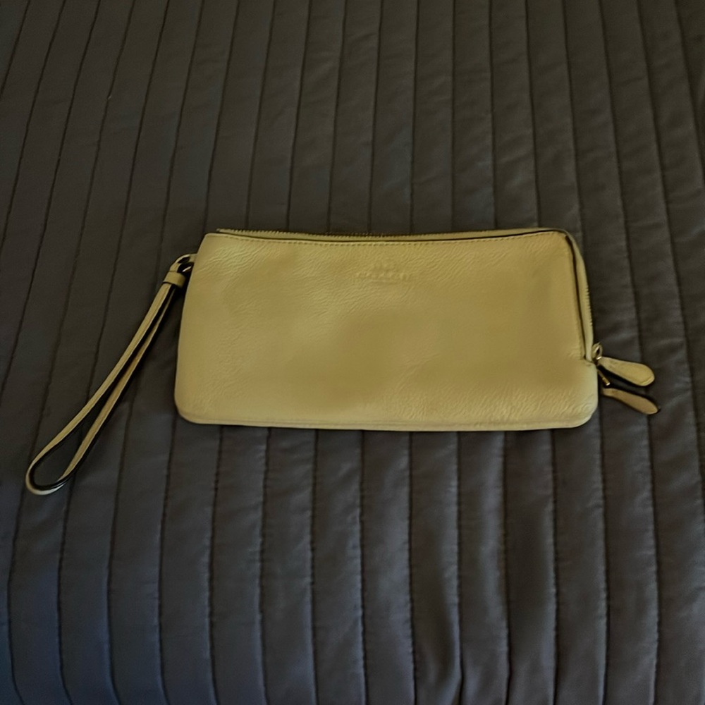 Rare Cream Coach zip around large wristlet